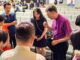 lutheran church in singapore hosts day of prayer in july 2026, with speaker bishop anthony loh praying with a group